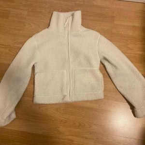 Fluffy cropped zip up w/ high neck